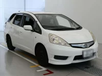 Цена авто Honda FIT SHUTTLE HYBRID с аукционов Японии, номер кузова GP2, пробег 117 000, оценка 7