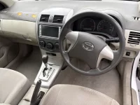 Цена авто Toyota Corolla Axio с аукционов Японии, номер кузова NZE141, пробег 239 000, оценка 7