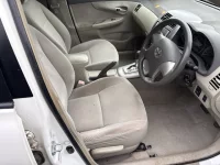 Цена авто Toyota Corolla Axio с аукционов Японии, номер кузова NZE141, пробег 239 000, оценка 7