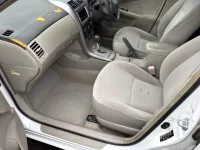 Цена авто Toyota Corolla Axio с аукционов Японии, номер кузова NZE141, пробег 239 000, оценка 7