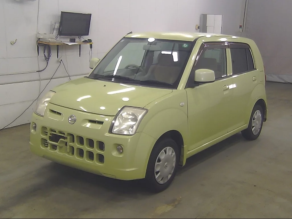 Nissan Pino  с аукциона в Японии