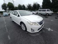 Цена авто Toyota Camry с аукционов Японии, номер кузова AVV50, пробег 73 000, оценка 20