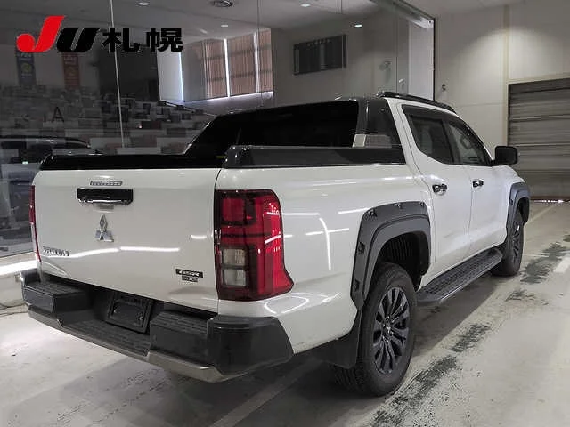 Mitsubishi Triton  с аукциона в Японии