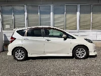 Цена авто Nissan Note с аукционов Японии, номер кузова HE12, пробег 130 000, оценка 8