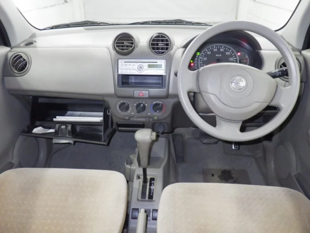 Nissan Pino  с аукциона в Японии