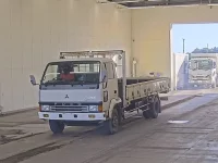 Цена авто Mitsubishi FUSO FIGHTER MIGNON с аукционов Японии, номер кузова FK337HK, пробег 256 000, оценка 6