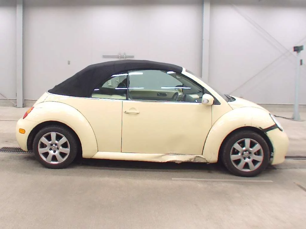 Volkswagen New Beetle  с аукциона в Японии