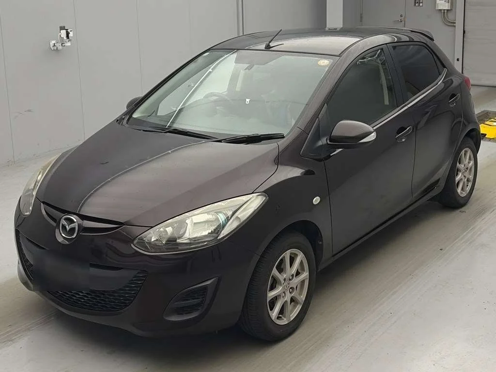 Mazda Demio  с аукциона в Японии