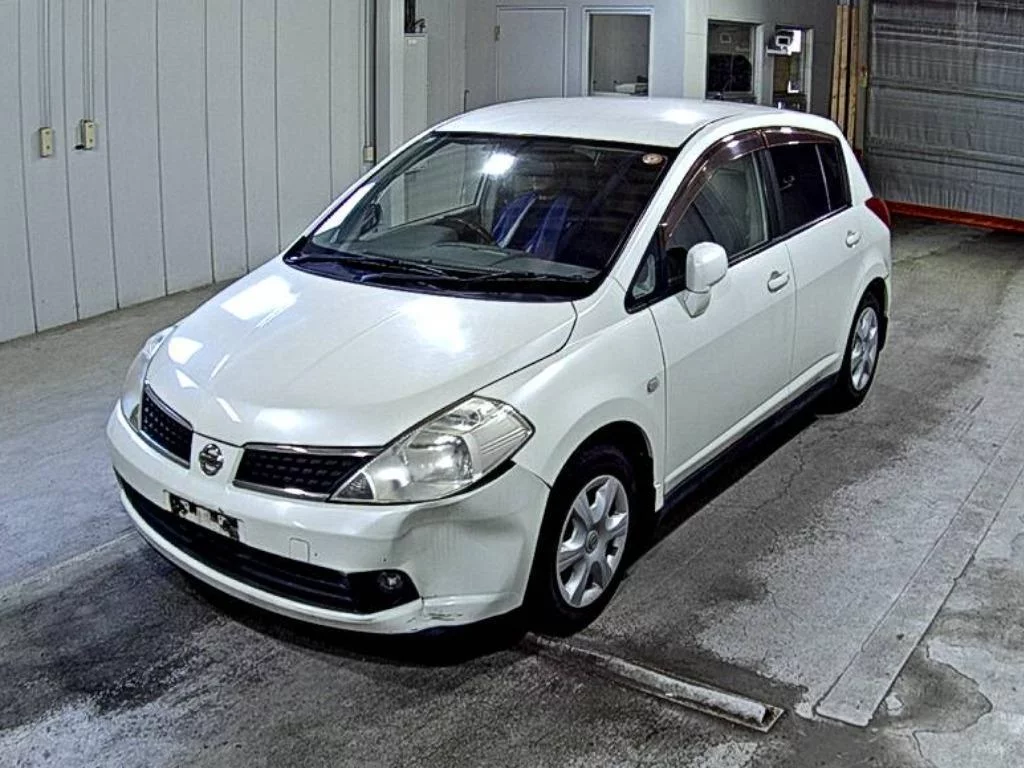 Nissan Tiida  с аукциона в Японии