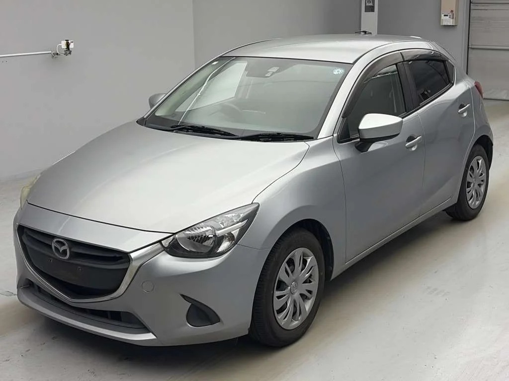 Mazda Demio  с аукциона в Японии