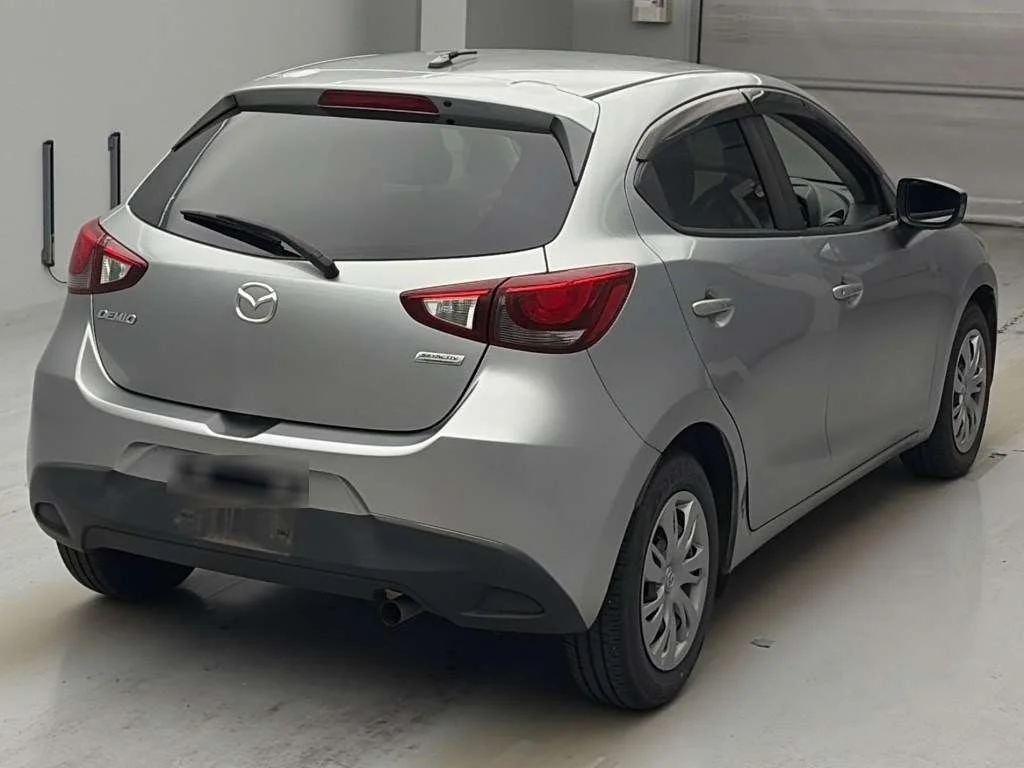 Mazda Demio  с аукциона в Японии