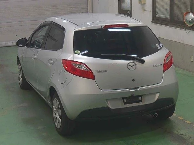 Mazda Demio  с аукциона в Японии