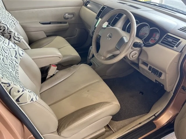 Nissan Tiida  с аукциона в Японии