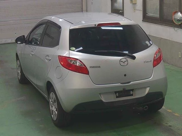 Mazda Demio  с аукциона в Японии