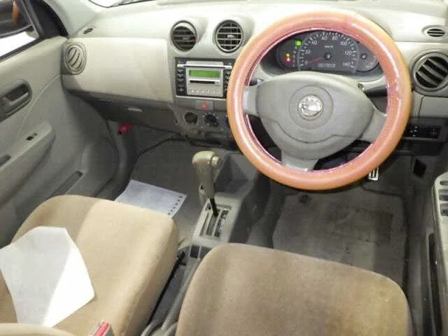 Nissan Pino  с аукциона в Японии