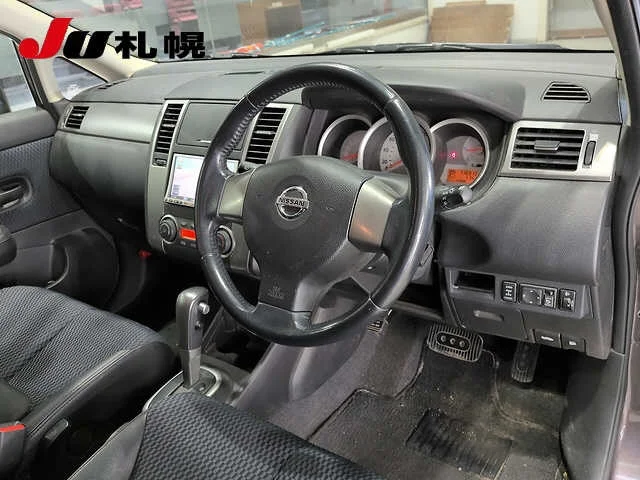 Nissan Tiida  с аукциона в Японии