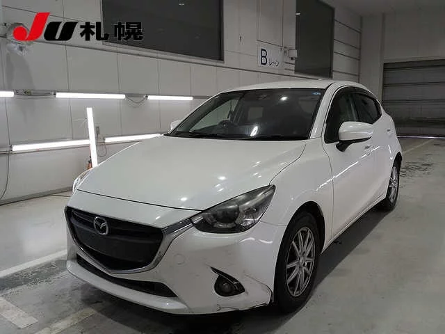 Mazda Demio  с аукциона в Японии