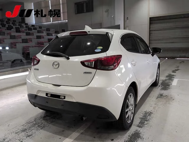 Mazda Demio  с аукциона в Японии
