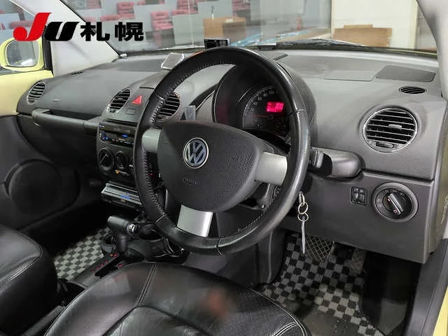Volkswagen New Beetle  с аукциона в Японии