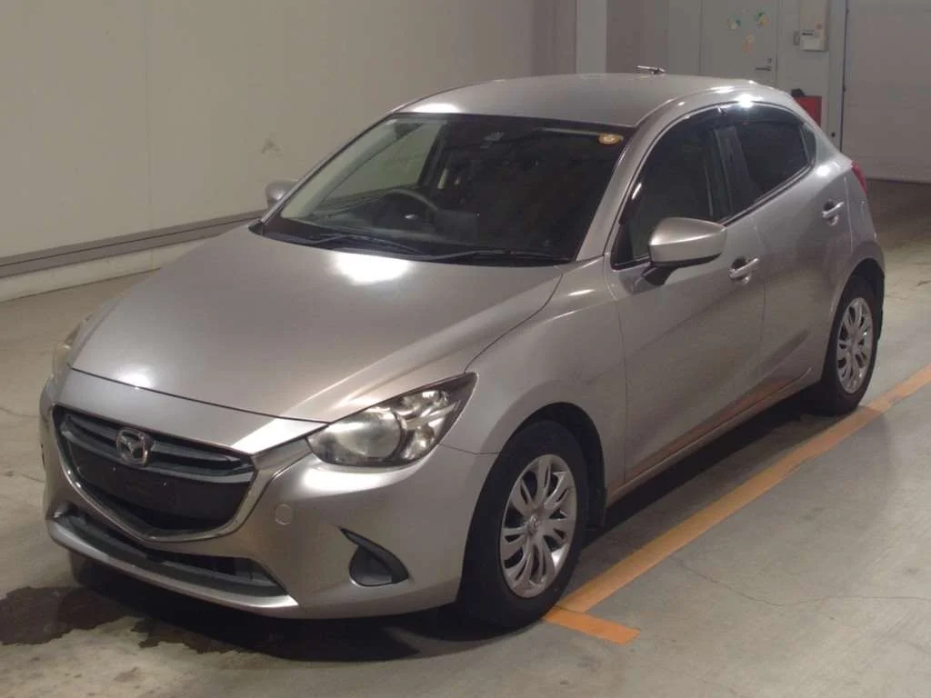 Mazda Demio  с аукциона в Японии