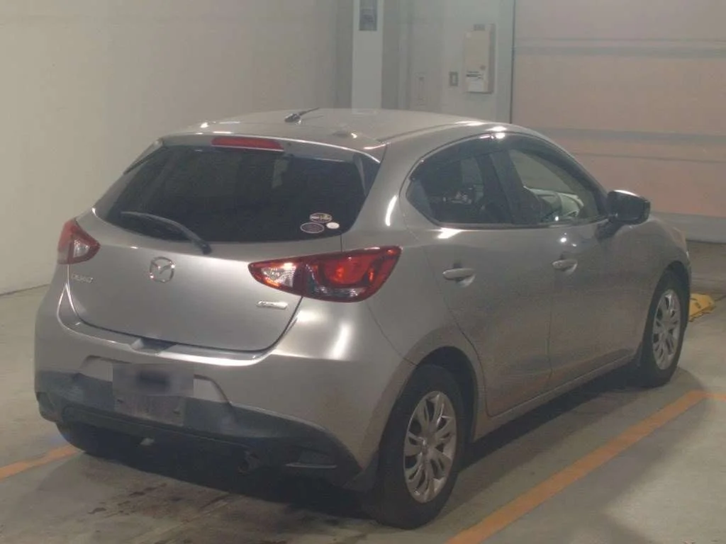 Mazda Demio  с аукциона в Японии
