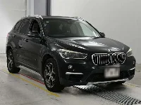 Цена авто BMW X1 с аукционов Японии, номер кузова HT20, пробег 86 000, оценка 3
