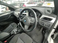 Цена авто BMW X1 с аукционов Японии, номер кузова HS20, пробег 76 000, оценка 8