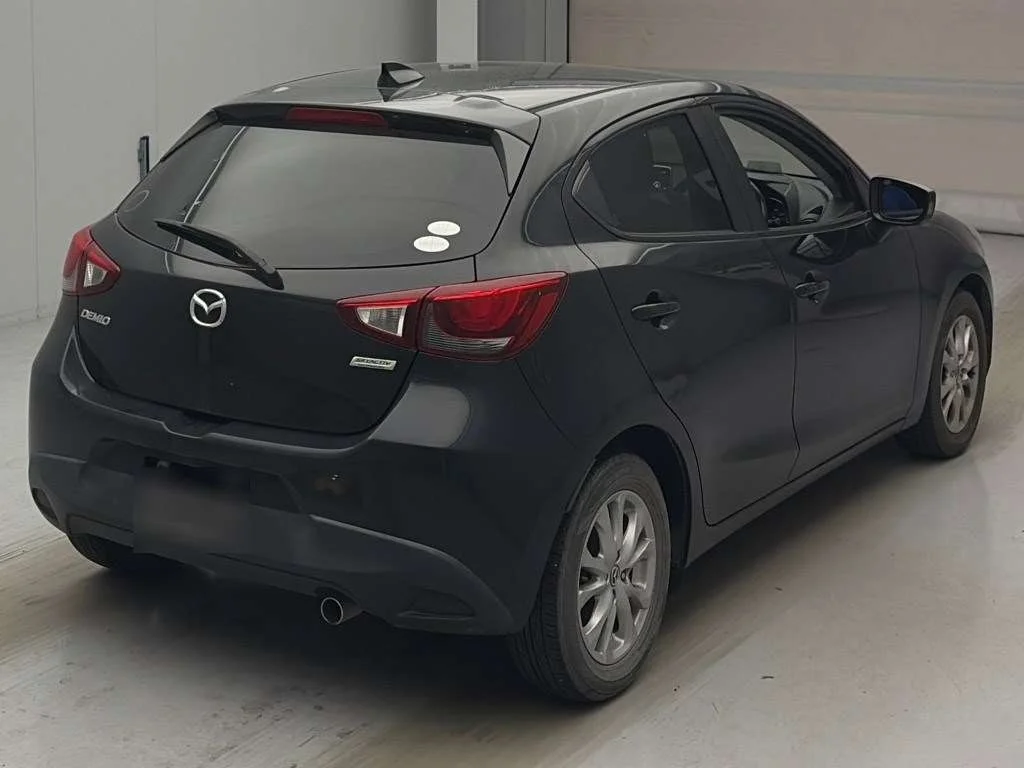 Mazda Demio  с аукциона в Японии