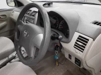 Цена авто Toyota Corolla Axio с аукционов Японии, номер кузова NZE144, пробег 188 000, оценка 9