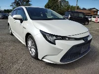 Цена авто Toyota Corolla Touring с аукционов Японии, номер кузова ZWE214W, пробег 182 000, оценка 